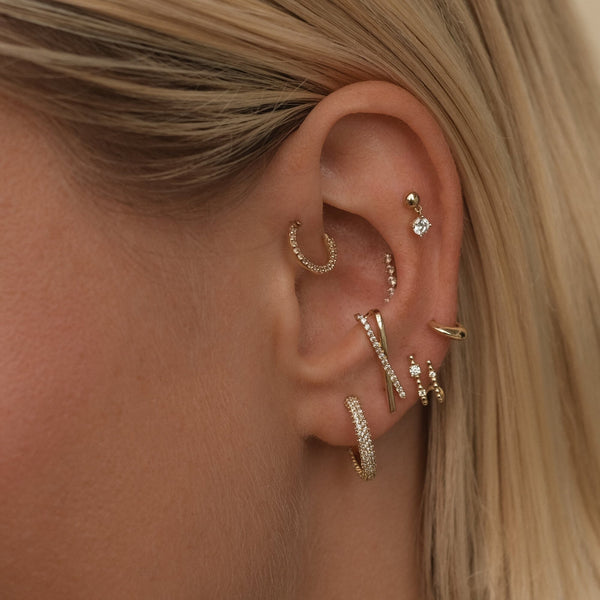 Kreed clicker piercing