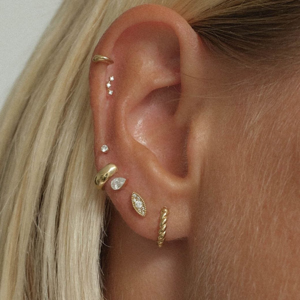 Con diamond contour piercing