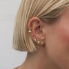 Crème crystal heart piercing