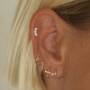 Jarrett triple micro flower piercing