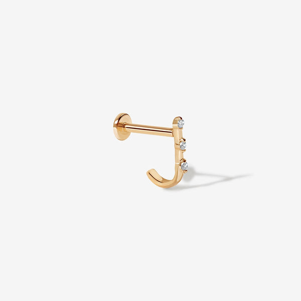 Lane diamond J piercing