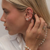 Leo large puffy pearl heart piercing