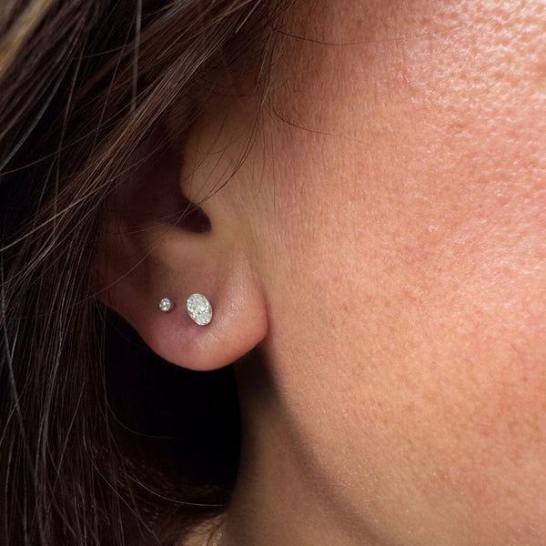 Luke oval diamond piercing