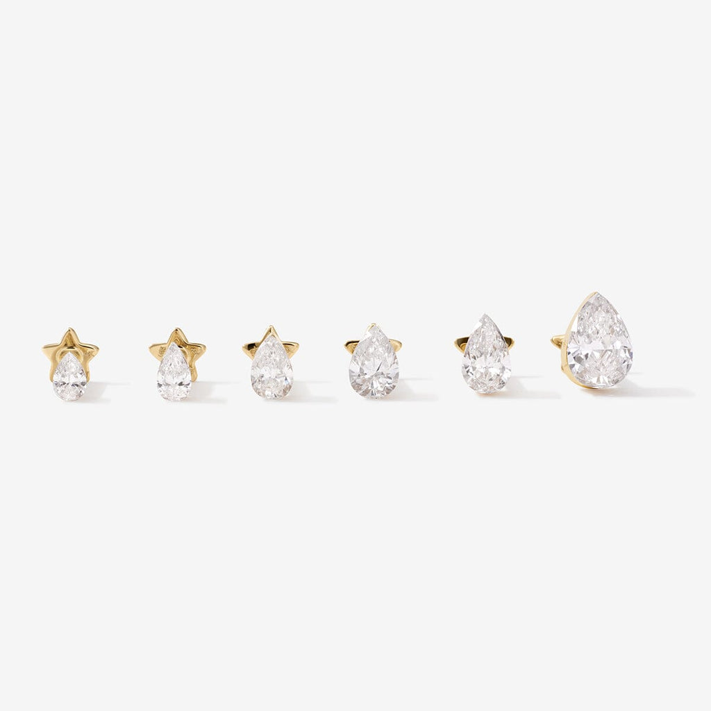 Hugh pear diamond piercing