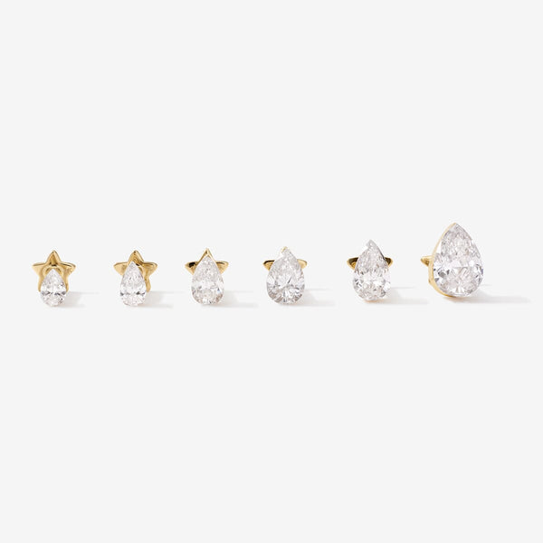 Hugh pear diamond piercing