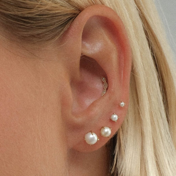 Theo pearl piercing